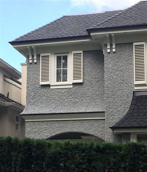 metal roof on stucco house|exterior stucco wall.